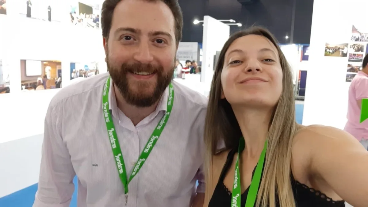 Nader alMaleh and a colleague at an exhibition