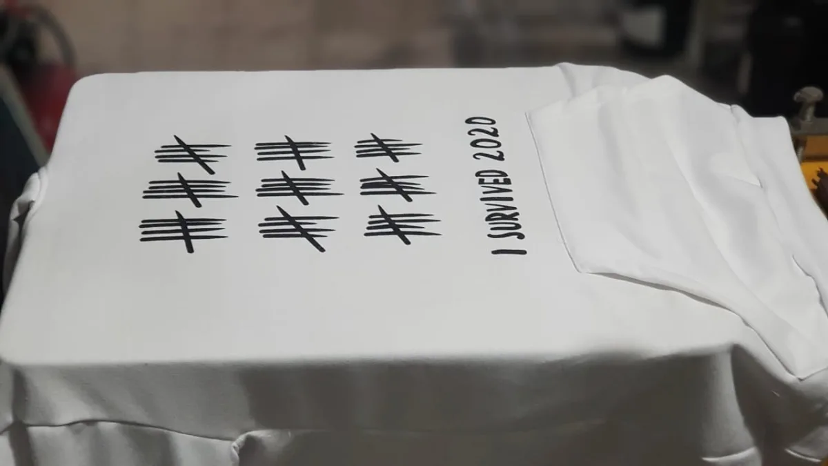 White printed T-shirt with a 2020 tally-mark design